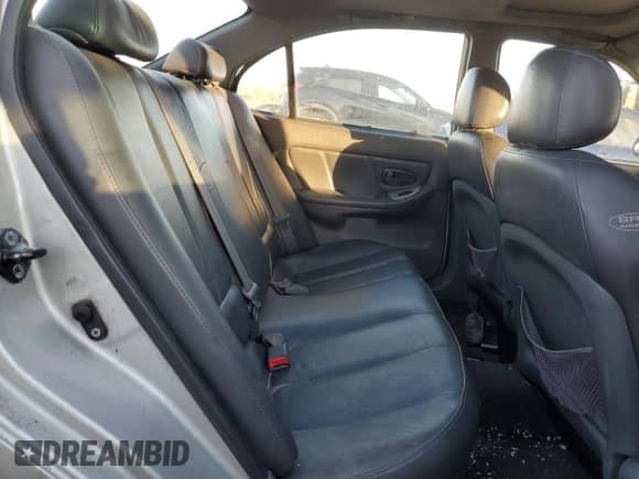 2003 Hyundai Elantra GLS z VIN KMHDN45D73U633397, wystawiony jako Copart lot #79562704 z przebiegiem 127 366 mil mil oraz Czysty tytuł • Clean title. Historia ofert i sprzedaży dostępna na DreamBid. Obrazek 10.