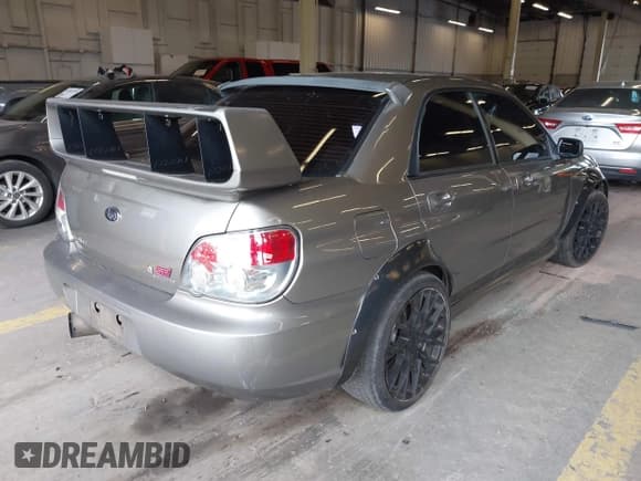 ✅ 2006 Subaru Impreza WRX STI • VIN: JF1GD70626L519824 • Lot: 42561283. Listed on IAAI with 148,589 mi. Free auction sales archive from the USA and detailed vehicle history report at DreamBid. Image 4.