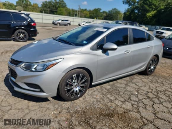 ✅ 2017 Chevrolet Cruze LS • VIN: 1G1BC5SM9H7212226 • Lot: 84060905. Listed on Copart with 117,201 mi. Free auction sales archive from the USA and detailed vehicle history report at DreamBid. Image 1.