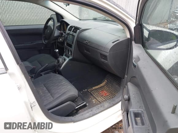 ✅ 2009 Dodge Caliber SE • VIN: 1B3HB28C59D151981 • Лот: 42438794. Опубликован ранее на IAAI с пробегом 165 560 миль. Бесплатный доступ к архиву аукционных продаж из США и подробный отчёт об истории автомобиля на DreamBid. Изображение 5.