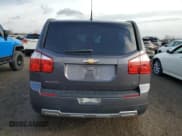 ✅ 2012 Chevrolet Orlando 1LT • VIN: KL77P2EM7CK587739 • Лот: 84156614. Опубликован ранее на Copart с пробегом 173 909 миль. Бесплатный доступ к архиву аукционных продаж из США и подробный отчёт об истории автомобиля на DreamBid. Изображение 6.