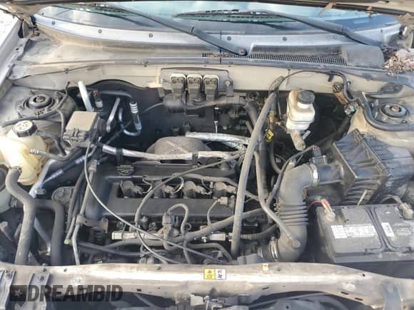 2006 Mercury Mariner Convenience with VIN 4M2YU56Z86DJ07304, listed as a Copart auction lot 68445985 with 177,279 mi miles and Salvage title. Bid and sale history available at DreamBid. Image 12.