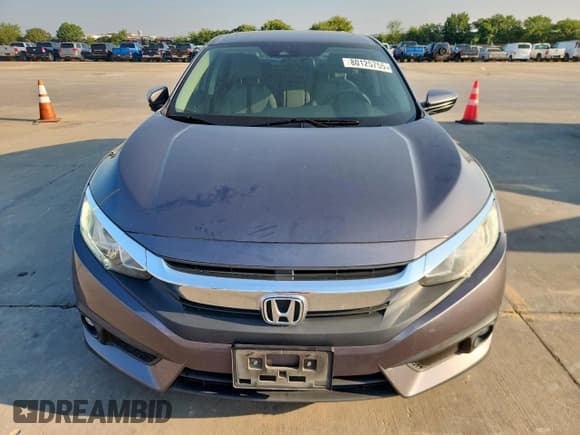 ✅ 2016 Honda Civic EX-T • VIN: 2HGFC1F44GH635442 • Lot: 80125755. Wystawiony na Copart z przebiegiem 129 651 mil. Bezpłatny archiwum sprzedaży aukcyjnych z USA i szczegółowy raport historii pojazdu na DreamBid. Zdjęcie 5.