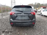 ✅ 2016 Mazda CX-5 Grand Touring • VIN: JM3KE4DY7G0716767 • Lot: 43573068. Wystawiony na IAAI z przebiegiem 231 937 mil. Bezpłatny archiwum sprzedaży aukcyjnych z USA i szczegółowy raport historii pojazdu na DreamBid. Zdjęcie 16.