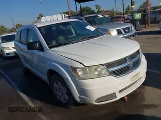 2009 Dodge Journey SE z VIN 3D4GG47B19T517707, wystawiony jako IAAI lot #43444416 z przebiegiem 157 139 mil mil oraz . Historia ofert i sprzedaży dostępna na DreamBid. Obrazek 1.