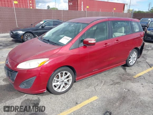 ✅ 2013 Mazda 5 Touring • VIN: JM1CW2CL6D0149807 • Lot: 43745505. Listed on IAAI with 162,227 mi. Free auction sales archive from the USA and detailed vehicle history report at DreamBid. Image 2.