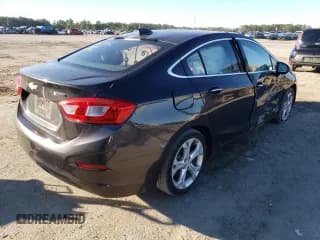 ✅ 2017 Chevrolet Cruze Premier • VIN: 1G1BF5SMXH7230712 • Lot: 38993753. Listed on Copart with 75,524 mi. Free auction sales archive from the USA and detailed vehicle history report at DreamBid. Image 3.