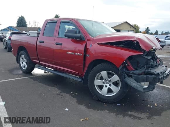 ✅ 2012 Ram 1500 Express • VIN: 1C6RD7FT2CS260437 • Lot: 43585831. Listed on IAAI with 122,835 mi. Free auction sales archive from the USA and detailed vehicle history report at DreamBid. Image 1.