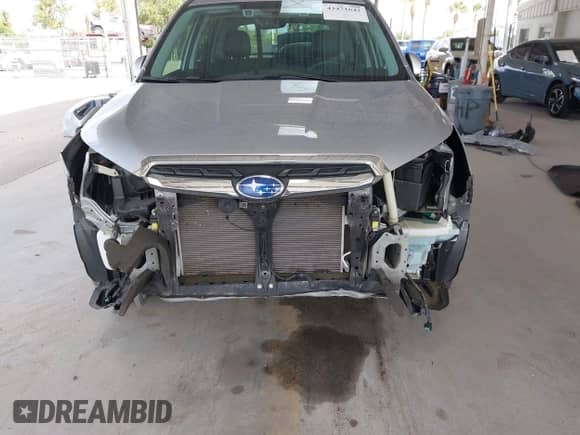 2017 Subaru Forester Touring z VIN JF2SJAWC7HH555670, wystawiony jako IAAI lot #43471642 z przebiegiem 89 476 mil mil oraz . Historia ofert i sprzedaży dostępna na DreamBid. Obrazek 6.