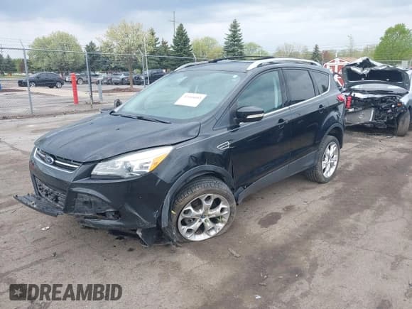 ✅ 2013 Ford Escape Titanium • VIN: 1FMCU9J9XDUC53579 • Lot: 42166603. Listed on IAAI with 112,736 mi. Free auction sales archive from the USA and detailed vehicle history report at DreamBid. Image 2.