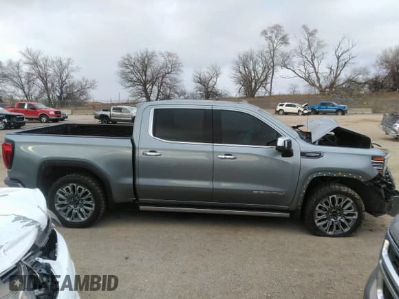 ✅ 2023 GMC Sierra 1500 Denali Ultimate • VIN: 1GTUUHEL2PZ270179 • Лот: 41263065. Опубликован ранее на IAAI с пробегом 23 712 миль. Бесплатный доступ к архиву аукционных продаж из США и подробный отчёт об истории автомобиля на DreamBid. Изображение 13.