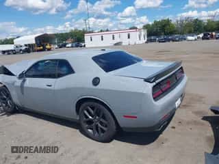 2021 Dodge Challenger GT z VIN 2C3CDZJG6MH600268, wystawiony jako IAAI lot #43091969 z przebiegiem 64 087 mil mil oraz . Historia ofert i sprzedaży dostępna na DreamBid. Obrazek 3.
