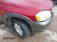 ✅ 2004 Mazda Tribute LX • VIN: 4F2YZ941X4KM09049 • Лот: 42506556. Опубликован ранее на IAAI с пробегом 219 437 миль. Бесплатный доступ к архиву аукционных продаж из США и подробный отчёт об истории автомобиля на DreamBid. Изображение 6.