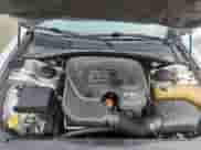 2012 Dodge Charger SE z VIN 2C3CDXBG2CH119614, wystawiony jako Copart lot #89668065 z przebiegiem 198 166 mil mil oraz Szkoda całkowita • Salvage title. Historia ofert i sprzedaży dostępna na DreamBid. Obrazek 11.