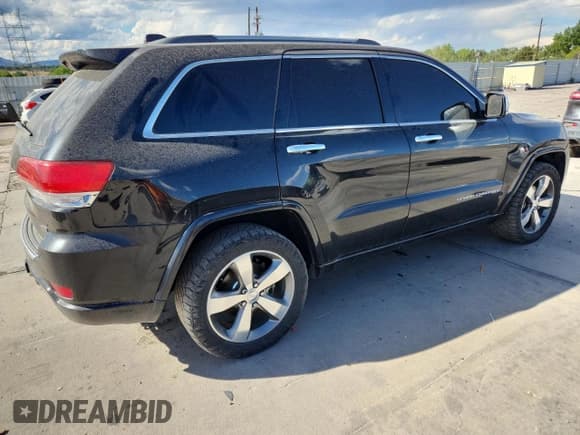✅ 2015 Jeep Grand Cherokee Overland • VIN: 1C4RJFCM9FC762451 • Lot: 80275465. Listed on Copart with 138,061 mi. Free auction sales archive from the USA and detailed vehicle history report at DreamBid. Image 3.