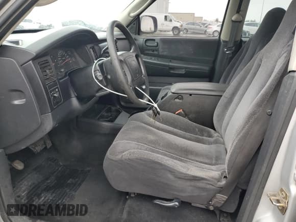 ✅ 2004 Dodge Dakota SLT • VIN: 1D7HG48N34S774345 • Lot: 82226034. Wystawiony na Copart z przebiegiem 177 733 mil. Bezpłatny archiwum sprzedaży aukcyjnych z USA i szczegółowy raport historii pojazdu na DreamBid. Zdjęcie 7.