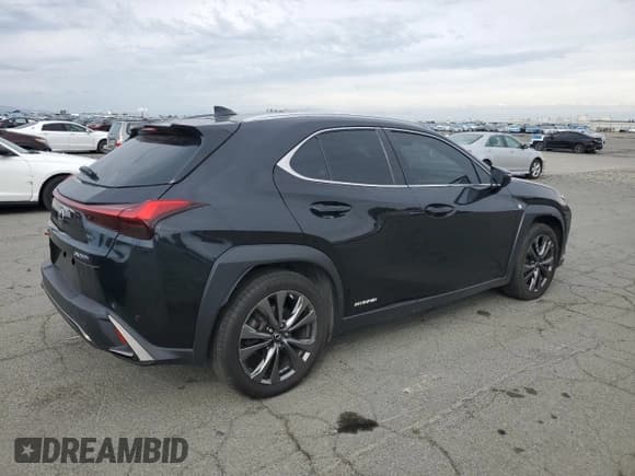 ✅ 2021 Lexus UX 250h F Sport • VIN: JTHE9JBH3M2053479 • Лот: 85153595. Опубликован ранее на Copart с пробегом 119 724 миль. Бесплатный доступ к архиву аукционных продаж из США и подробный отчёт об истории автомобиля на DreamBid. Изображение 3.