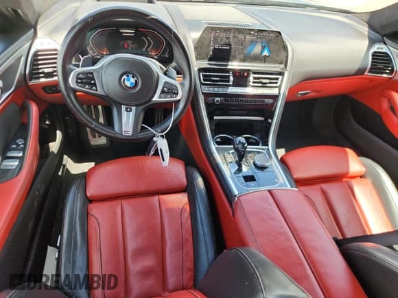 ✅ 2022 BMW 8 Series M850i • VIN: WBAGV8C05NCH25206 • Lot: 65091315. Wystawiony na Copart z przebiegiem 30 540 mil. Bezpłatny archiwum sprzedaży aukcyjnych z USA i szczegółowy raport historii pojazdu na DreamBid. Zdjęcie 8.