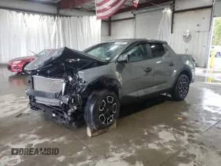 2024 Hyundai Santa Cruz SEL с VIN 5NTJBDAEXRH100494, выставлен на аукционе Copart как лот 81604825 с пробегом Не указан миль и Списание • Salvage title. История ставок и продаж доступна на DreamBid. Изображение 1.
