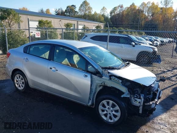 ✅ 2017 Kia Rio LX • VIN: KNADM4A34H6057216 • Lot: 43595271. Listed on IAAI with 92,388 mi. Free auction sales archive from the USA and detailed vehicle history report at DreamBid. Image 1.