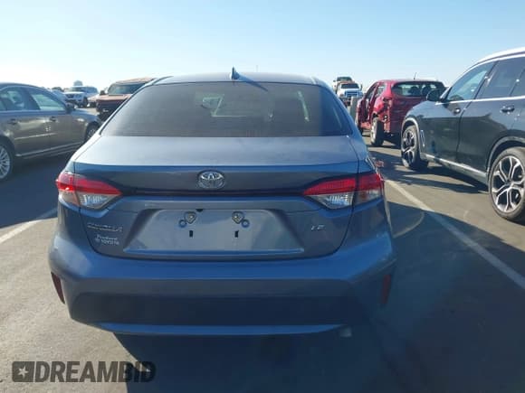 ✅ 2021 Toyota Corolla LE • VIN: JTDEPMAE5MJ124980 • Lot: 43506447. Listed on IAAI with 65,485 mi. Free auction sales archive from the USA and detailed vehicle history report at DreamBid. Image 16.