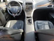 ✅ 2015 Lincoln MKZ • VIN: 3LN6L2JK8FR608723 • Lot: 71072085. Listed on Copart with 99,457 mi. Free auction sales archive from the USA and detailed vehicle history report at DreamBid. Image 8.