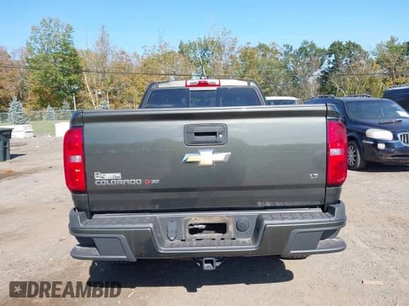 2018 Chevrolet Colorado 4WD LT с VIN 1GCHTCEN0J1150055, выставлен на аукционе IAAI как лот 43375677 с пробегом 35 362 миль миль и . История ставок и продаж доступна на DreamBid. Изображение 16.