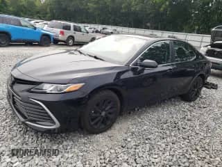 2021 Toyota Camry LE with VIN 4T1C11BK9MU033300, listed as a Copart auction lot 67339775 with 16,064 mi miles and Salvage title. Bid and sale history available at DreamBid. Image 1.