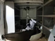 ✅ 2021 Nissan NV Cargo SV • VIN: 1N6BF0KY5MN803581 • Lot: 46721995. Wystawiony na Copart z przebiegiem 141 636 mil. Bezpłatny archiwum sprzedaży aukcyjnych z USA i szczegółowy raport historii pojazdu na DreamBid. Zdjęcie 10.