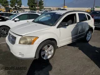 ✅ 2010 Dodge Caliber SXT • VIN: 1B3CB4HA3AD595658 • Лот: 85376495. Опубликован ранее на Copart с пробегом 209 626 миль. Бесплатный доступ к архиву аукционных продаж из США и подробный отчёт об истории автомобиля на DreamBid. Изображение 1.