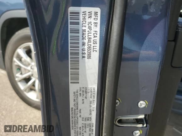 ✅ 2020 Jeep Cherokee Altitude • VIN: 1C4PJLLB4LD653986 • Lot: 66932065. Listed on Copart with 99,629 mi. Free auction sales archive from the USA and detailed vehicle history report at DreamBid. Image 13.