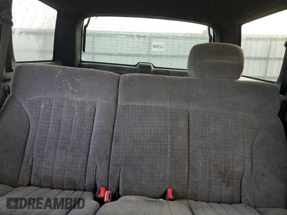 2002 Chevrolet Blazer LS z VIN 1GNDT13W12K169005, wystawiony jako Copart lot #84643884 z przebiegiem Nie podano mil oraz Szkoda całkowita • Salvage title. Historia ofert i sprzedaży dostępna na DreamBid. Obrazek 10.