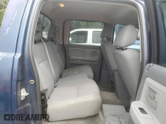 2007 Dodge Dakota SLT z VIN 1D7HW48P17S172567, wystawiony jako Copart lot #70854984 z przebiegiem 156 148 mil mil oraz Czysty tytuł • Clean title. Historia ofert i sprzedaży dostępna na DreamBid. Obrazek 10.
