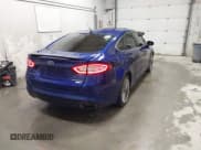 ✅ 2014 Ford Fusion Titanium • VIN: 3FA6P0D97ER317642 • Lot: 43507222. Listed on IAAI with 148,357 mi. Free auction sales archive from the USA and detailed vehicle history report at DreamBid. Image 4.