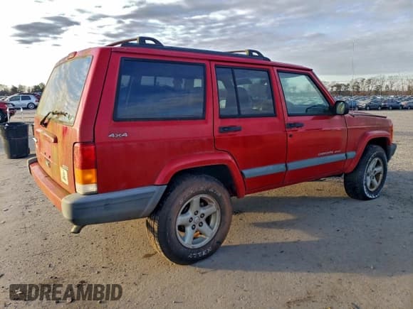 ✅ 2000 Jeep Cherokee • VIN: 1J4FF48S4YL120524 • Lot: 96563525. Listed on Copart with 162,156 mi. Free auction sales archive from the USA and detailed vehicle history report at DreamBid. Image 3.