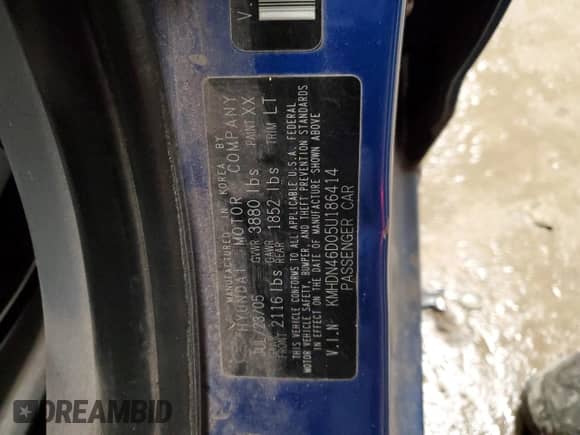 2005 Hyundai Elantra GLS z VIN KMHDN46D05U186414, wystawiony jako Copart lot #82921324 z przebiegiem 141 258 mil mil oraz Szkoda całkowita • Salvage title. Historia ofert i sprzedaży dostępna na DreamBid. Obrazek 12.