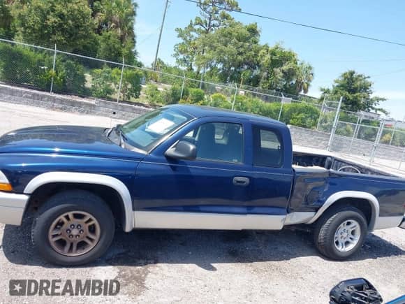 2003 Dodge Dakota SLT with VIN 1D7HL42N83S256346, listed as a IAAI auction lot 42454110 with 75,961 mi miles and . Bid and sale history available at DreamBid. Image 14.