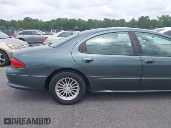 ✅ 2004 Chrysler Concorde LXi • VIN: 2C3HD36M64H633854 • Lot: 42392859. Listed on IAAI with 129,010 mi. Free auction sales archive from the USA and detailed vehicle history report at DreamBid. Image 13.