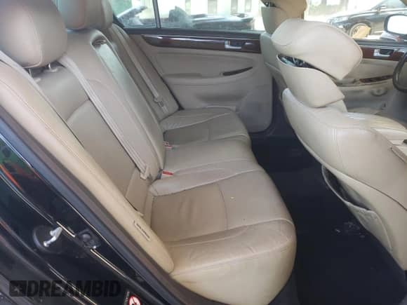 2014 Hyundai Genesis 3.8L z VIN KMHGC4DD7EU264239, wystawiony jako Copart lot #69198604 z przebiegiem 171 305 mil mil oraz Szkoda całkowita • Salvage title. Historia ofert i sprzedaży dostępna na DreamBid. Obrazek 10.