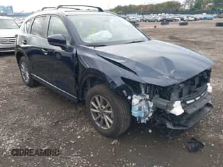 ✅ 2025 Mazda CX-5 S Select • VIN: JM3KFBBL0S0554417 • Lot: 43487288. Listed on IAAI with 9,482 mi. Free auction sales archive from the USA and detailed vehicle history report at DreamBid. Image 1.