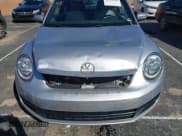 ✅ 2015 Volkswagen Beetle 1.8T • VIN: 3VWF17AT9FM651641 • Lot: 43559860. Listed on IAAI with 80,780 mi. Free auction sales archive from the USA and detailed vehicle history report at DreamBid. Image 6.