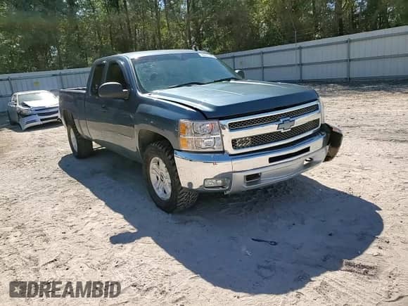 2012 Chevrolet Silverado 1500 LT with VIN 1GCRCSE02CZ148654, listed as a Copart auction lot 86171285 with 218,565 mi miles and Salvage title. Bid and sale history available at DreamBid. Image 13.