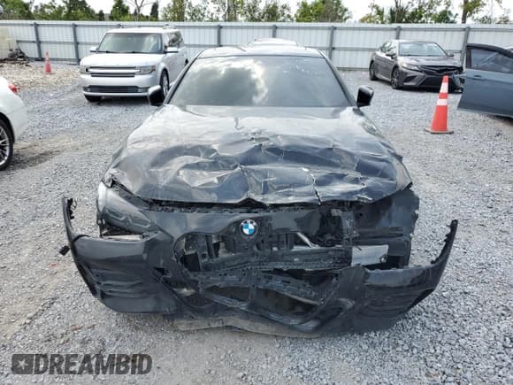 ✅ 2022 BMW 4 Series 430i • VIN: WBA53AP08NCJ06319 • Lot: 50144015. Wystawiony na Copart z przebiegiem 17 935 mil. Bezpłatny archiwum sprzedaży aukcyjnych z USA i szczegółowy raport historii pojazdu na DreamBid. Zdjęcie 5.