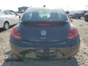 ✅ 2013 Volkswagen Beetle Turbo • VIN: 3VWVT7AT4DM686557 • Lot: 67603975. Wystawiony na Copart z przebiegiem 68 612 mil. Bezpłatny archiwum sprzedaży aukcyjnych z USA i szczegółowy raport historii pojazdu na DreamBid. Zdjęcie 6.