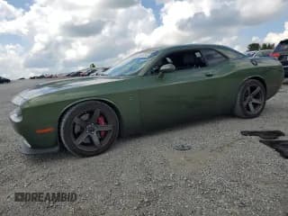 ✅ 2018 Dodge Challenger SRT Hellcat • VIN: 2C3CDZC97JH309692 • Lot: 67811595. Listed on Copart with 49,617 mi. Free auction sales archive from the USA and detailed vehicle history report at DreamBid. Image 1.