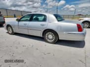 ✅ 1998 Lincoln Town Car Signature • VIN: 1LNFM82W8WY698345 • Lot: 61454625. Listed on Copart with 87,959 mi. Free auction sales archive from the USA and detailed vehicle history report at DreamBid. Image 2.