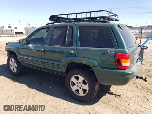 ✅ 1999 Jeep Grand Cherokee Limited • VIN: 1J4GW68SXXC581130 • Lot: 43532245. Wystawiony na Copart z przebiegiem 265 886 mil. Bezpłatny archiwum sprzedaży aukcyjnych z USA i szczegółowy raport historii pojazdu na DreamBid. Zdjęcie 2.