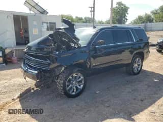 2015 Chevrolet Tahoe LTZ with VIN 1GNSKCKC6FR170659, listed as a Copart auction lot 69412835 with 252,198 mi miles and Salvage title. Bid and sale history available at DreamBid. Image 1.