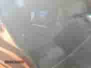 2007 Chevrolet Aveo LS z VIN KL1TD56617B146360, wystawiony jako Copart lot #75254624 z przebiegiem 147 108 mil mil oraz Szkoda całkowita • Salvage title. Historia ofert i sprzedaży dostępna na DreamBid. Obrazek 10.