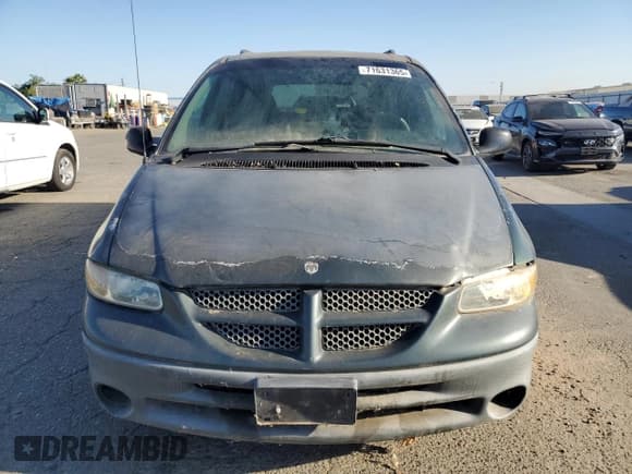 ✅ 2000 Dodge Caravan LE • VIN: 1B4GP54L7YB571056 • Lot: 71631365. Listed on Copart with 136,970 mi. Free auction sales archive from the USA and detailed vehicle history report at DreamBid. Image 5.